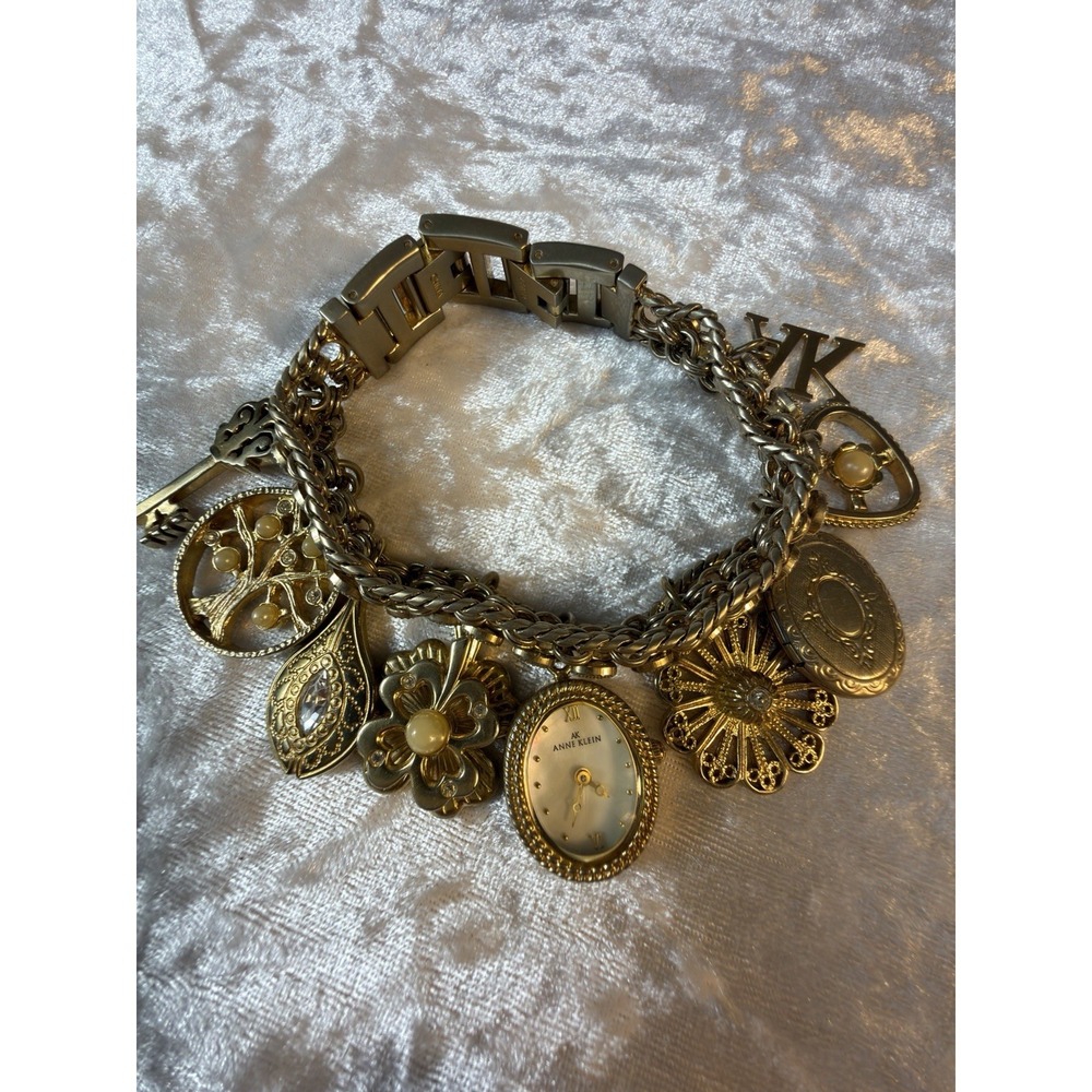 Anne Klein AK Charm Bracelet Watch Gold Tone Toggle Locket Tree Key Heart